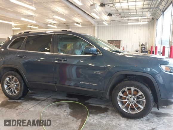 2019 Jeep Cherokee Latitude Plus with VIN 1C4PJMLX0KD361879, listed as a IAAI auction lot 40435950 with 148,830 mi miles. Bid and sale history available at carsss.com. Image 13.