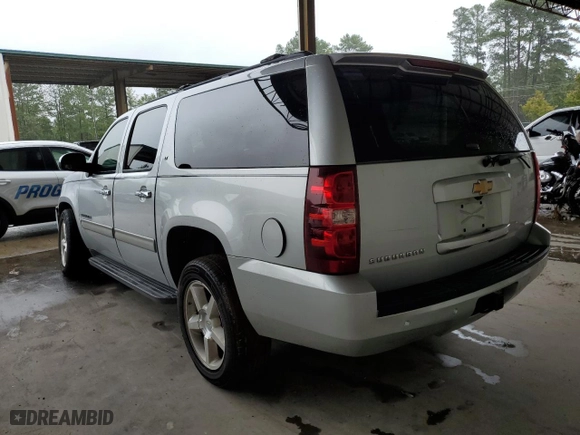 2013 Chevrolet Suburban LT with VIN 1GNSKJE76DR123518, listed as a Copart auction lot 66334144 with 270,402 mi miles and Salvage Title. Bid and sale history available at carsss.com. Image 2.