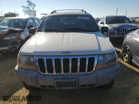 1999 Jeep Grand Cherokee Laredo z VIN 1J4GW58N8XC736438, wystawiony jako Copart lot #88605625 z przebiegiem 181 612 mil mil oraz Czysty tytuł • Clean title. Historia ofert i sprzedaży dostępna na DreamBid. Obrazek 5.