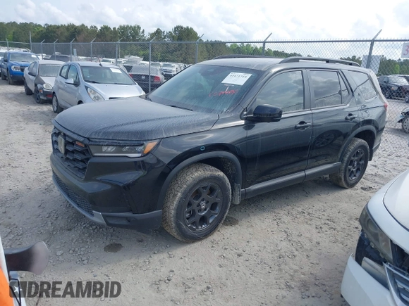 2025 Honda Pilot TrailSport with VIN 5FNYG1H61SB026477, listed as a IAAI auction lot 41471719 with 12,624 mi miles and . Bid and sale history available at DreamBid. Image 17.