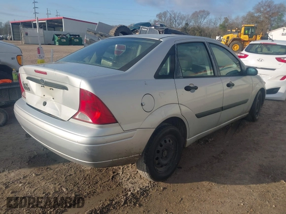 2001 Ford Focus LX with VIN 1FAFP33P21W309425, listed as a IAAI auction lot 41482071 with 86,943 mi miles and . Bid and sale history available at carsss.com. Image 4.