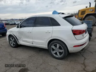 2015 Audi Q3 2.0T Premium Plus with VIN WA1EFCFS9FR009843, listed as a Copart auction lot 51218455 with 118,381 mi miles and Salvage Title. Bid and sale history available at carsss.com. Image 2.
