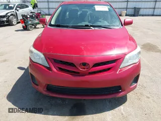 2012 Toyota Corolla L with VIN 5YFBU4EE4CP059104, listed as a IAAI auction lot 42124080 with 336,674 mi miles. Bid and sale history available at carsss.com. Image 12.