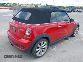 2014 MINI Convertible S z VIN WMWZP3C56ET707702, wystawiony jako IAAI lot #42431046 z przebiegiem 65 726 mil mil oraz . Historia ofert i sprzedaży dostępna na DreamBid. Obrazek 4.