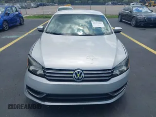 2014 Volkswagen Passat S with VIN 1VWAS7A38EC028292, listed as a IAAI auction lot 42357817 with 151,695 mi miles and . Bid and sale history available at DreamBid. Image 13.