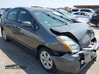 2007 Toyota Prius z VIN JTDKB20U173242693, wystawiony jako IAAI lot #42310546 z przebiegiem 250 887 mil mil oraz . Historia ofert i sprzedaży dostępna na DreamBid. Obrazek 1.