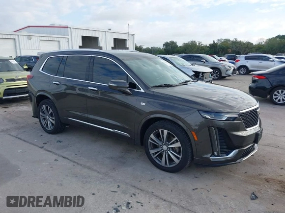 2020 Cadillac XT6 AWD Premium Luxury with VIN 1GYKPDRS2LZ205541, listed as a IAAI auction lot 41224342 with 53,947 mi miles and . Bid and sale history available at DreamBid. Image 1.