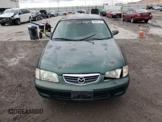 2001 Mazda 626 LX with VIN 1YVGF22C215245817, listed as a Copart auction lot 80491144 with 147,603 mi miles and Salvage Title. Bid and sale history available at carsss.com. Image 5.
