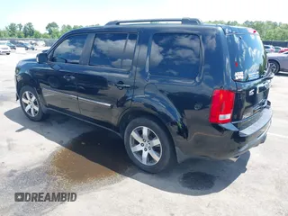 2013 Honda Pilot Touring z VIN 5FNYF3H98DB023104, wystawiony jako IAAI lot #42310538 z przebiegiem 169 385 mil mil oraz . Historia ofert i sprzedaży dostępna na DreamBid. Obrazek 3.