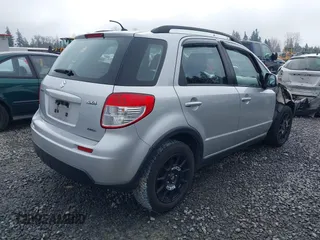 2010 Suzuki SX4 with VIN JS2YB5A3XA6300216, listed as a IAAI auction lot 41869046 with 129,709 mi miles and . Bid and sale history available at DreamBid. Image 4.