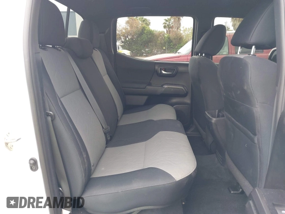 2021 Toyota Tacoma SR5 z VIN 3TMDZ5BN2MM100245, wystawiony jako IAAI lot #42078914 z przebiegiem 58 153 mil mil oraz . Historia ofert i sprzedaży dostępna na DreamBid. Obrazek 8.