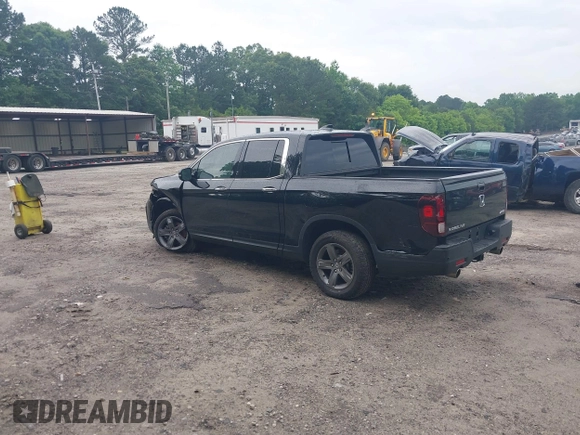 2023 Honda Ridgeline RTL-E with VIN 5FPYK3F77PB052828, listed as a IAAI auction lot 42366947 with 24,658 mi miles and . Bid and sale history available at DreamBid. Image 3.