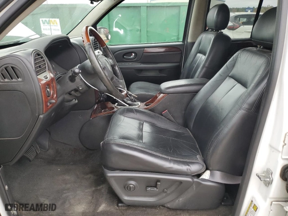2005 GMC Envoy Denali with VIN 1GKET63M452384525, listed as a Copart auction lot 82117214 with 182,469 mi miles and Salvage Title. Bid and sale history available at carsss.com. Image 7.