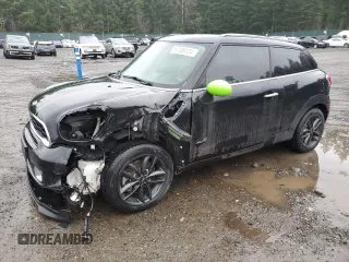 2014 MINI Paceman S with VIN WMWSS7C54EWN71799, listed as a Copart auction lot 87088134 with 45,250 mi miles and Salvage Title. Bid and sale history available at DreamBid. Image 1.