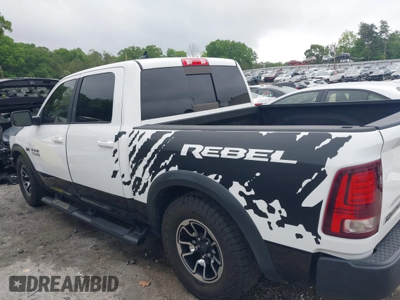 2017 Ram 1500 Rebel with VIN 1C6RR7YT7HS575529, listed as a IAAI auction lot 42125529 with 110,722 mi miles and . Bid and sale history available at DreamBid. Image 14.
