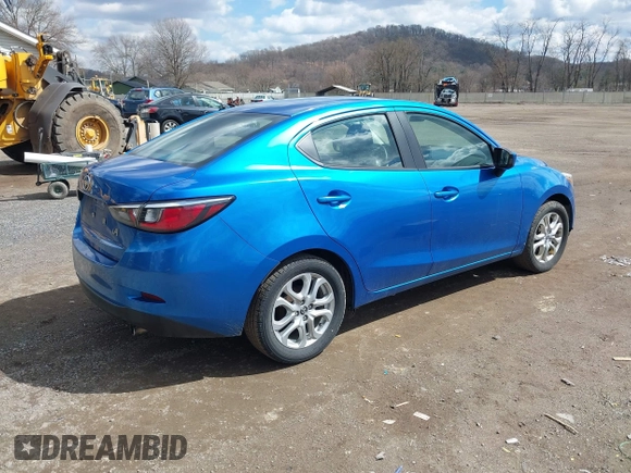 2016 Scion iA with VIN 3MYDLBZV8GY121248, listed as a IAAI auction lot 41843573 with 126,269 mi miles. Bid and sale history available at carsss.com. Image 4.