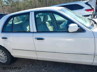 2007 Mercury Grand Marquis LS with VIN 2MEFM75V57X630666, listed as a IAAI auction lot 41791234 with 155,290 mi miles. Bid and sale history available at carsss.com. Image 13.