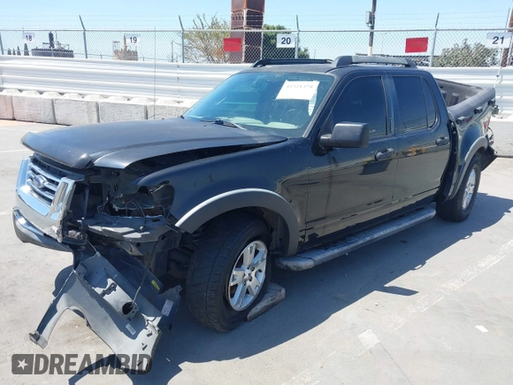 2007 Ford Explorer Sport Trac XLT z VIN 1FMEU31K17UA01300, wystawiony jako IAAI lot #42321378 z przebiegiem 221 813 mil mil oraz . Historia ofert i sprzedaży dostępna na DreamBid. Obrazek 2.