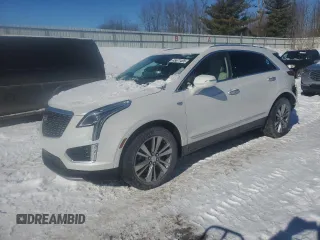 2024 Cadillac XT5 AWD Premium Luxury z VIN 1GYKNDRS4RZ753023, wystawiony jako Copart lot #45671495 z przebiegiem 8 855 mil mil oraz Nie do naprawy • Non repairable. Historia ofert i sprzedaży dostępna na DreamBid. Obrazek 1.