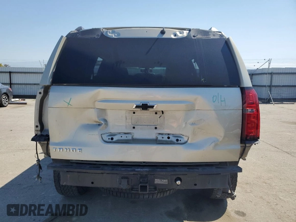 2016 Chevrolet Tahoe LS with VIN 1GNSCAKC7GR465949, listed as a Copart auction lot 50030625 with 136,608 mi miles and Salvage title. Bid and sale history available at DreamBid. Image 6.