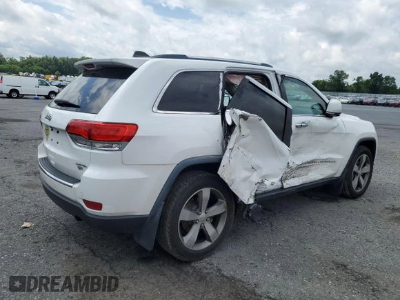 2014 Jeep Grand Cherokee Limited with VIN 1C4RJFBG2EC569780, listed as a Copart auction lot 61708755 with 69,058 mi miles and Salvage title. Bid and sale history available at DreamBid. Image 3.