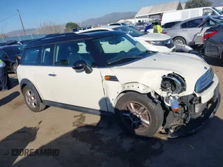 2012 MINI Clubman z VIN WMWZF3C58CT189866, wystawiony jako IAAI lot #41637796 z przebiegiem 97 073 mil mil oraz . Historia ofert i sprzedaży dostępna na DreamBid. Obrazek 13.