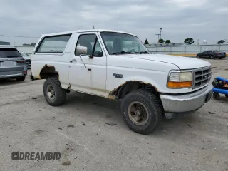 1996 Ford Bronco XL z VIN 1FMEU15N7TLB20204, wystawiony jako Copart lot #58887615 z przebiegiem 214 944 mil mil oraz Czysty tytuł • Clean title. Historia ofert i sprzedaży dostępna na DreamBid. Obrazek 4.