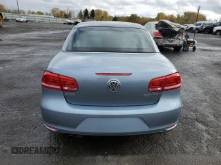 2013 Volkswagen Eos Komfort with VIN WVWBW8AH9DV007077, listed as a Copart auction lot 80254434 with 87,620 mi miles and Salvage Title. Bid and sale history available at DreamBid. Image 6.