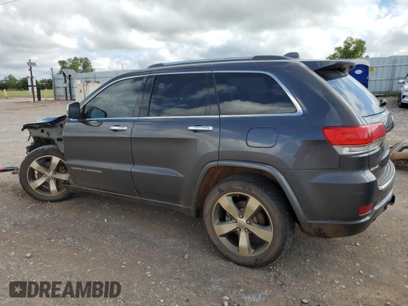 2015 Jeep Grand Cherokee Overland with VIN 1C4RJFCT4FC813510, listed as a Copart auction lot 41466395 with 135,124 mi miles and Salvage Title. Bid and sale history available at carsss.com. Image 2.
