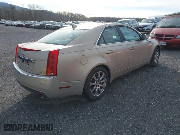 2009 Cadillac CTS AWD w/1SB with VIN 1G6DT57V090154165, listed as a IAAI auction lot 41907798 with 167,874 mi miles. Bid and sale history available at carsss.com. Image 4.