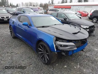 2016 Chevrolet Camaro 1LT with VIN 1G1FA1RX5G0165333, listed as a IAAI auction lot 41856530 with 118,923 mi miles. Bid and sale history available at carsss.com. Image 1.