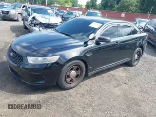 2014 Ford Police Interceptor with VIN 1FAHP2MK0EG170496, listed as a IAAI auction lot 42693683 with 147,921 mi miles and . Bid and sale history available at DreamBid. Image 18.
