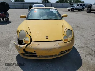 1999 Porsche 911 z VIN WP0AA2998XS620298, wystawiony jako Copart lot #59540745 z przebiegiem Nie podano mil oraz Szkoda całkowita • Salvage title. Historia ofert i sprzedaży dostępna na DreamBid. Obrazek 5.