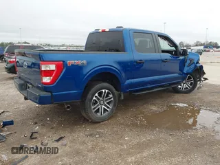 2023 Ford F-150 XL with VIN 1FTEW1EP6PKD00320, listed as a IAAI auction lot 41562733 with 19,468 mi miles. Bid and sale history available at carsss.com. Image 4.