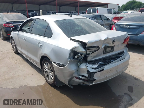2016 Volkswagen Jetta Sedan 1.4T SE with VIN 3VWD67AJXGM319278, listed as a IAAI auction lot 41954099 with 92,614 mi miles. Bid and sale history available at carsss.com. Image 3.