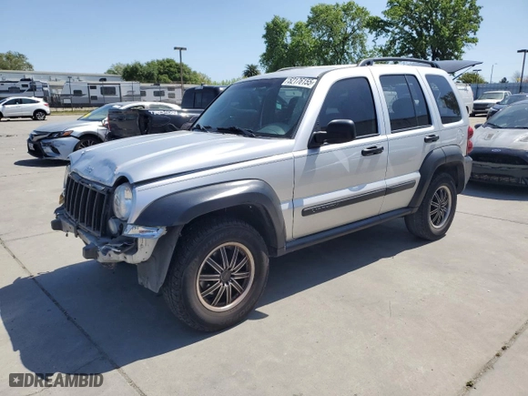 2005 Jeep Liberty Sport with VIN 1J4GK48K95W682154, listed as a Copart auction lot 52176155 with 164,743 mi miles and Salvage Title. Bid and sale history available at carsss.com. Image 1.