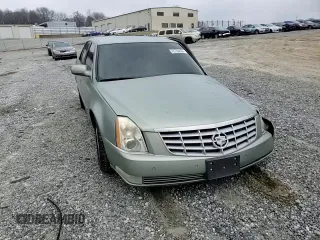 2006 Cadillac DTS 1SD z VIN 1G6KD57YX6U193025, wystawiony jako Copart lot #45784605 z przebiegiem Nie podano mil oraz Szkody całkowita. Historia ofert i sprzedaży dostępna na DreamBid. Obrazek 10.