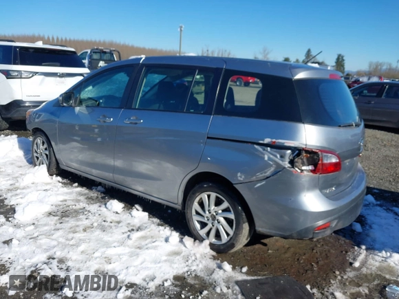 2014 Mazda 5 Sport with VIN JM1CW2BLXE0168119, listed as a IAAI auction lot 41527688 with 142,357 mi miles and . Bid and sale history available at DreamBid. Image 3.