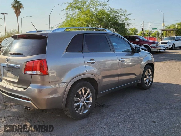 2011 Kia Sorento SX with VIN 5XYKW4A23BG164399, listed as a Copart auction lot 62526505 with 196,401 mi miles and Clean title. Bid and sale history available at DreamBid. Image 4.