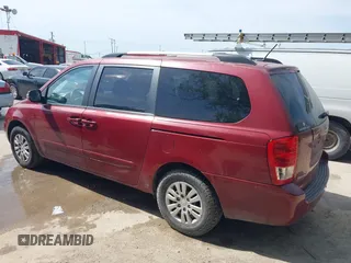 2014 Kia Sedona LX with VIN KNDMG4C71E6564595, listed as a IAAI auction lot 42015687 with 208,270 mi miles. Bid and sale history available at carsss.com. Image 3.