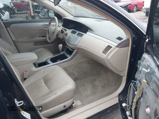 2009 Toyota Avalon XL with VIN 4T1BK36B89U344013, listed as a IAAI auction lot 41494834 with 203,339 mi miles and . Bid and sale history available at DreamBid. Image 5.