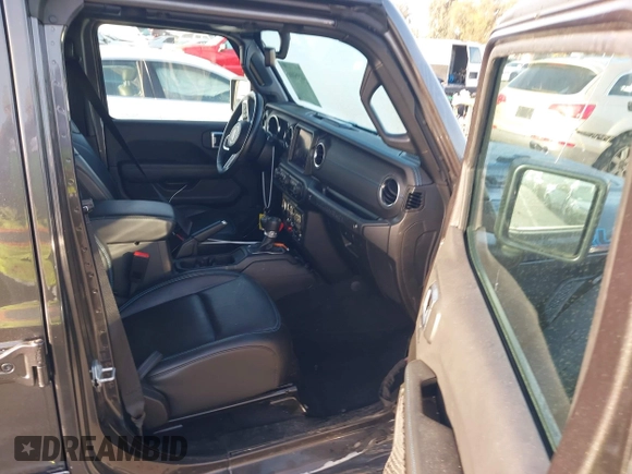 2023 Jeep Wrangler Rubicon with VIN 1C4JJXR67PW662277, listed as a IAAI auction lot 41950065 with 35,714 mi miles and . Bid and sale history available at DreamBid. Image 5.