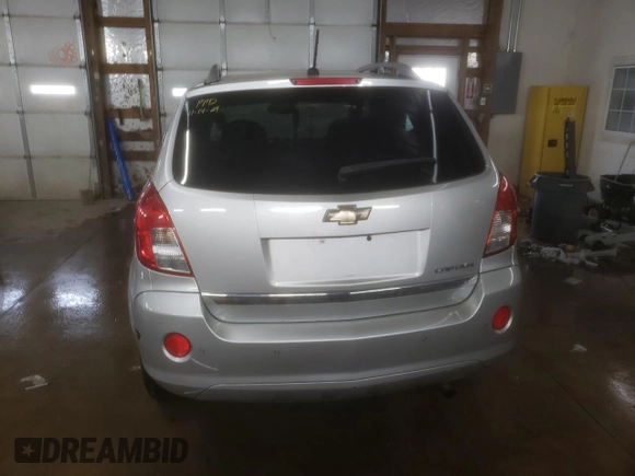 2014 Chevrolet Captiva Sport LTZ with VIN 3GNAL4EK4ES513420, listed as a Copart auction lot 82768864 with 93,791 mi miles and Salvage Title. Bid and sale history available at DreamBid. Image 6.