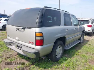 2004 GMC Yukon SLE z VIN 1GKEC13V94R293218, wystawiony jako IAAI lot #41939912 z przebiegiem 336 393 mil mil oraz . Historia ofert i sprzedaży dostępna na DreamBid. Obrazek 4.