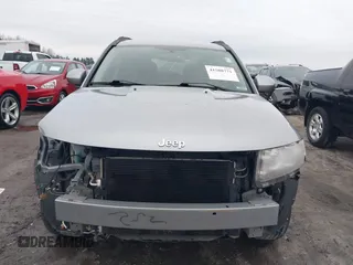 2016 Jeep Compass Latitude with VIN 1C4NJCEA2GD719694, listed as a IAAI auction lot 41508771 with 121,469 mi miles. Bid and sale history available at carsss.com. Image 13.