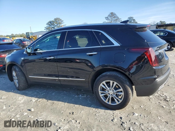 2023 Cadillac XT5 FWD Premium Luxury with VIN 1GYKNCR48PZ132957, listed as a Copart auction lot 42132845 with 27,312 mi miles and Salvage Title. Bid and sale history available at carsss.com. Image 2.