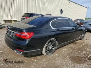 2018 BMW 7 Series 740i with VIN WBA7E2C57JG742193, listed as a Copart auction lot 79301864 with 87,706 mi miles and Salvage Title. Bid and sale history available at carsss.com. Image 3.