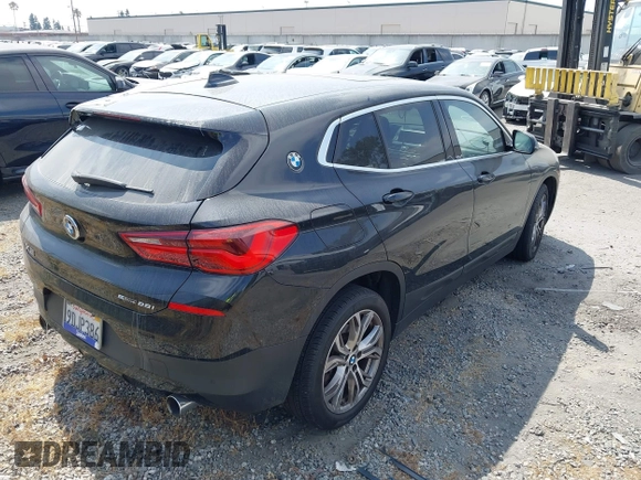 2019 BMW X2 sDrive28i with VIN WBXYJ3C58KEP77334, listed as a IAAI auction lot 42575165 with 98,910 mi miles and . Bid and sale history available at DreamBid. Image 4.