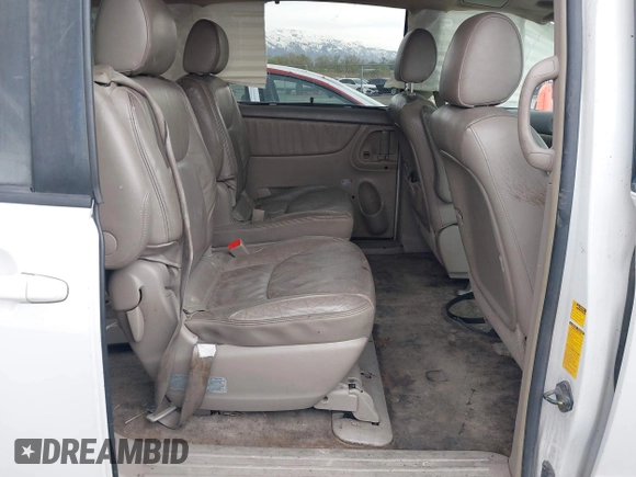 2005 Toyota Sienna XLE z VIN 5TDZA22C15S290471, wystawiony jako IAAI lot #42028879 z przebiegiem 298 992 mil mil oraz . Historia ofert i sprzedaży dostępna na DreamBid. Obrazek 8.