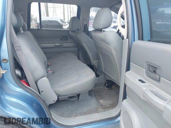 2005 Dodge Durango SXT with VIN 1D4HD38K05F512153, listed as a IAAI auction lot 41215391 with 178,553 mi miles and . Bid and sale history available at DreamBid. Image 8.